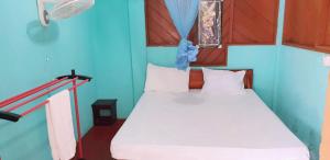 Katil atau katil-katil dalam bilik di Nirmaa Shadow Inn