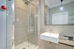 Phòng tắm tại Dom & House - Apartment Neptun Park Premium