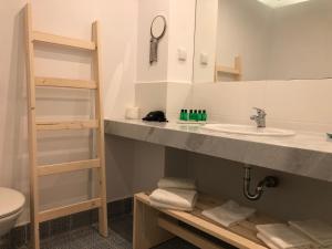 חדר רחצה ב-Sunrise Blue Magic Resort - All Inclusive