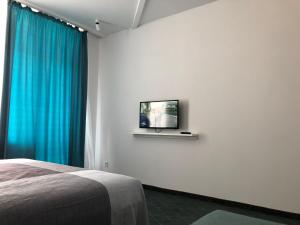 טלויזיה ו/או מרכז בידור ב-Sunrise Blue Magic Resort - All Inclusive