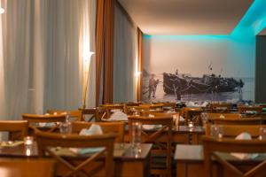 Um restaurante ou outro lugar para comer em Vila Baleira Porto Santo