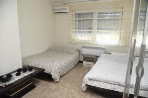 Letto o letti in una camera di Apartmani Sofronic Loznica 1