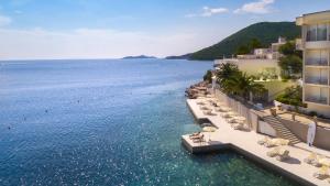 a view of the ocean from a hotel at Aminess Lume Hotel in Brna