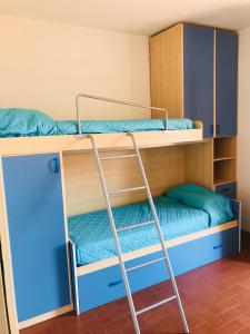 Μία ή περισσότερες κουκέτες σε δωμάτιο στο Stella Apartments