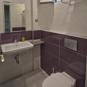 Koupelna v ubytování Hotel Nestor