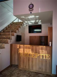 a staircase with a sign that reads repopride at Hotel Prestige Beach in Costinesti +44 photos