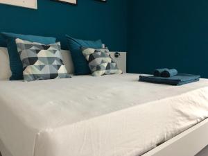 Łóżko lub łóżka w pokoju w obiekcie B&B Luxury Apartments