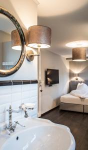 Postel nebo postele na pokoji v ubytování Landcafe mit Mini Hotel