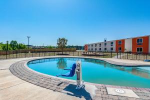 a swimming pool with a slide in a building at Motel 6-White, GA - Cartersville in White