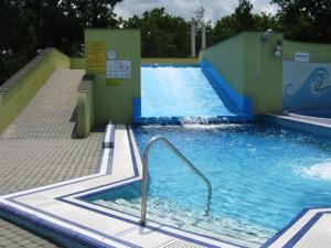 The swimming pool at or close to Virágos Apartman Balatonszemes