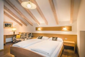 Letto o letti in una camera di Pension Merisana