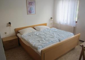 Postel nebo postele na pokoji v ubytování Ferienhaus Vulkaneifel Kopp