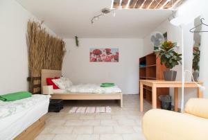Posteľ alebo postele v izbe v ubytovaní Rastlinky.sk Greenhouse Guestrooms