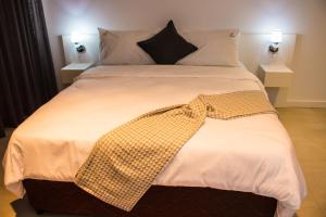 Postel nebo postele na pokoji v ubytování Palm Aparthotel