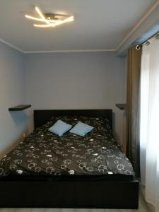 Voodi või voodid majutusasutuse TESTO Apartments toas