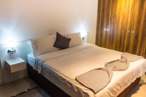 Postel nebo postele na pokoji v ubytování Palm Aparthotel
