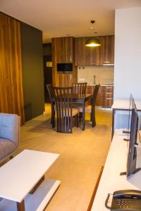 Kuchyň nebo kuchyňský kout v ubytování Palm Aparthotel