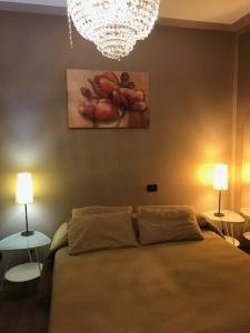 A bed or beds in a room at Il Ghetto Farm Holiday