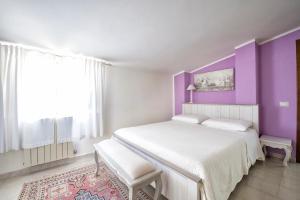 Postel nebo postele na pokoji v ubytování B&B Da Marcella