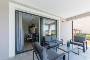 Posedenie v ubytovaní Villa Fjolla