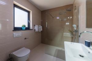 Kúpeľňa v ubytovaní Villa Fjolla