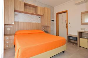 Postel nebo postele na pokoji v ubytování Hotel Lidia