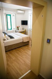 Katil atau katil-katil dalam bilik di Soukki Town Centre Suites