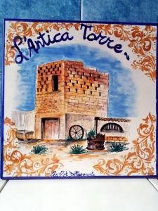 a painting of a building with the words sirmione tower at L'ANTICA TORRE in Marsala