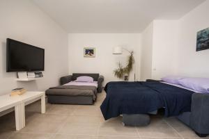 Postel nebo postele na pokoji v ubytování Apartment Sofia