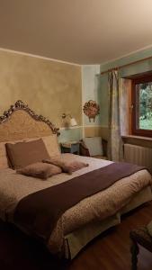 Katil atau katil-katil dalam bilik di Country House Dolomiti