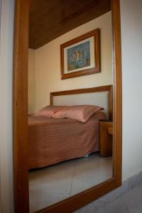 Cama o camas de una habitación en Garimpo da Terra Suítes