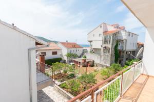 a view from the balcony of a house at Apartments Visnja in Primošten +26 photos
