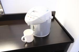 Coffee and tea making facilities at APA Hotel Hikoneminami