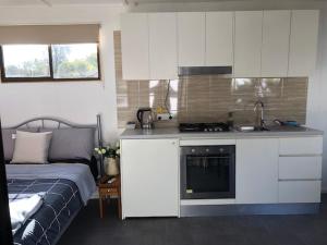 
A kitchen or kitchenette at Wonky Stables Holiday Park
