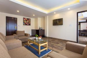 TV a/nebo společenská místnost v ubytování Bodhi Suites Boutique Hotel and Spa