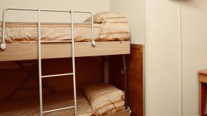 Postel nebo postele na pokoji v ubytování Hotel Donatello