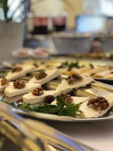 a plate of food on a table at Guest House Neho in Cres +49 photos
