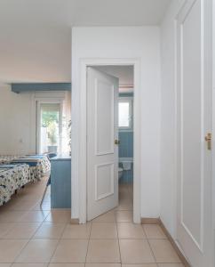 Postel nebo postele na pokoji v ubytování Hotel Platja d'Aro