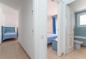 Postel nebo postele na pokoji v ubytování Hotel Platja d'Aro