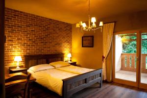 Postel nebo postele na pokoji v ubytování Lavender Hill, Eko Resort & Wellness