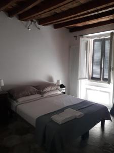 A bed or beds in a room at B&B Castellani