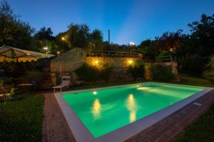 The swimming pool at or close to villa Ada Belriguardo