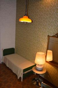 Postel nebo postele na pokoji v ubytování B&B VILLA LUPIDI