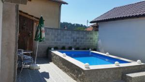 The swimming pool at or close to Banya Guest Rooms 23