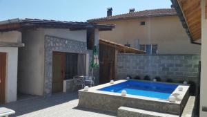 The swimming pool at or close to Banya Guest Rooms 23