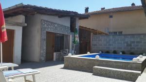 The swimming pool at or close to Banya Guest Rooms 23