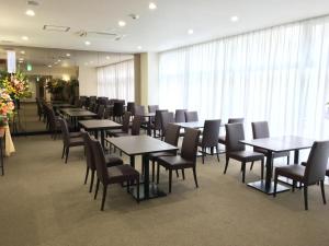 Restoran või mõni muu söögikoht majutusasutuses Hotel Tetora Asahikawa Station