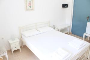 Postel nebo postele na pokoji v ubytování Mare Blue Ios