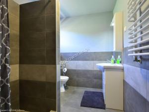Kúpeľňa v ubytovaní Apartamenty u Bodzia
