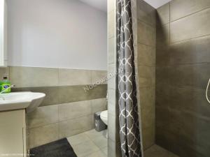 Kúpeľňa v ubytovaní Apartamenty u Bodzia